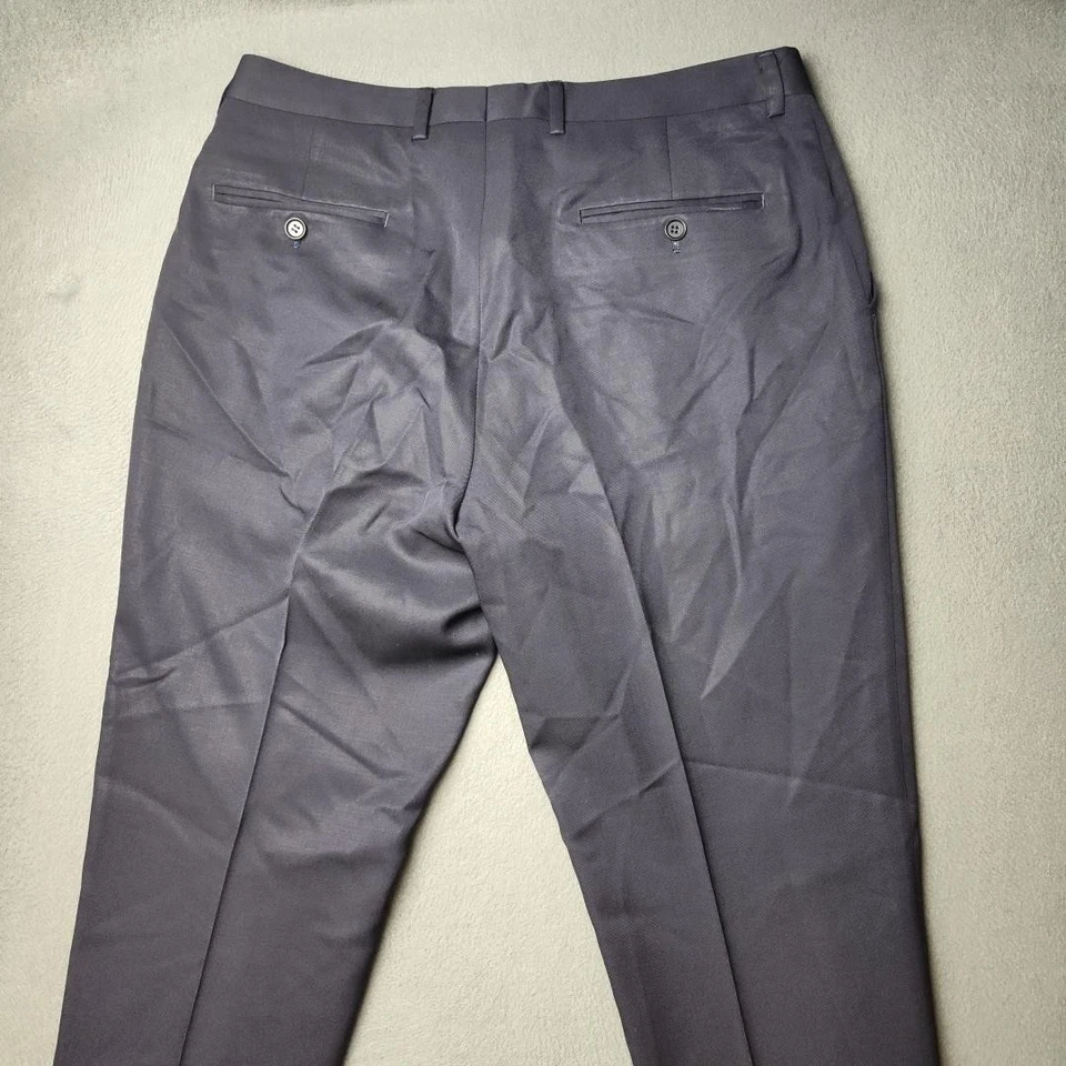 Pantalones de vestir Charles Tyrwhitt para hombre 34x30 azul lana a medida frente plano Foto 4 de 4