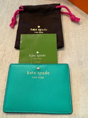 NWOT Kate Spade teal business card case with original dust jacket