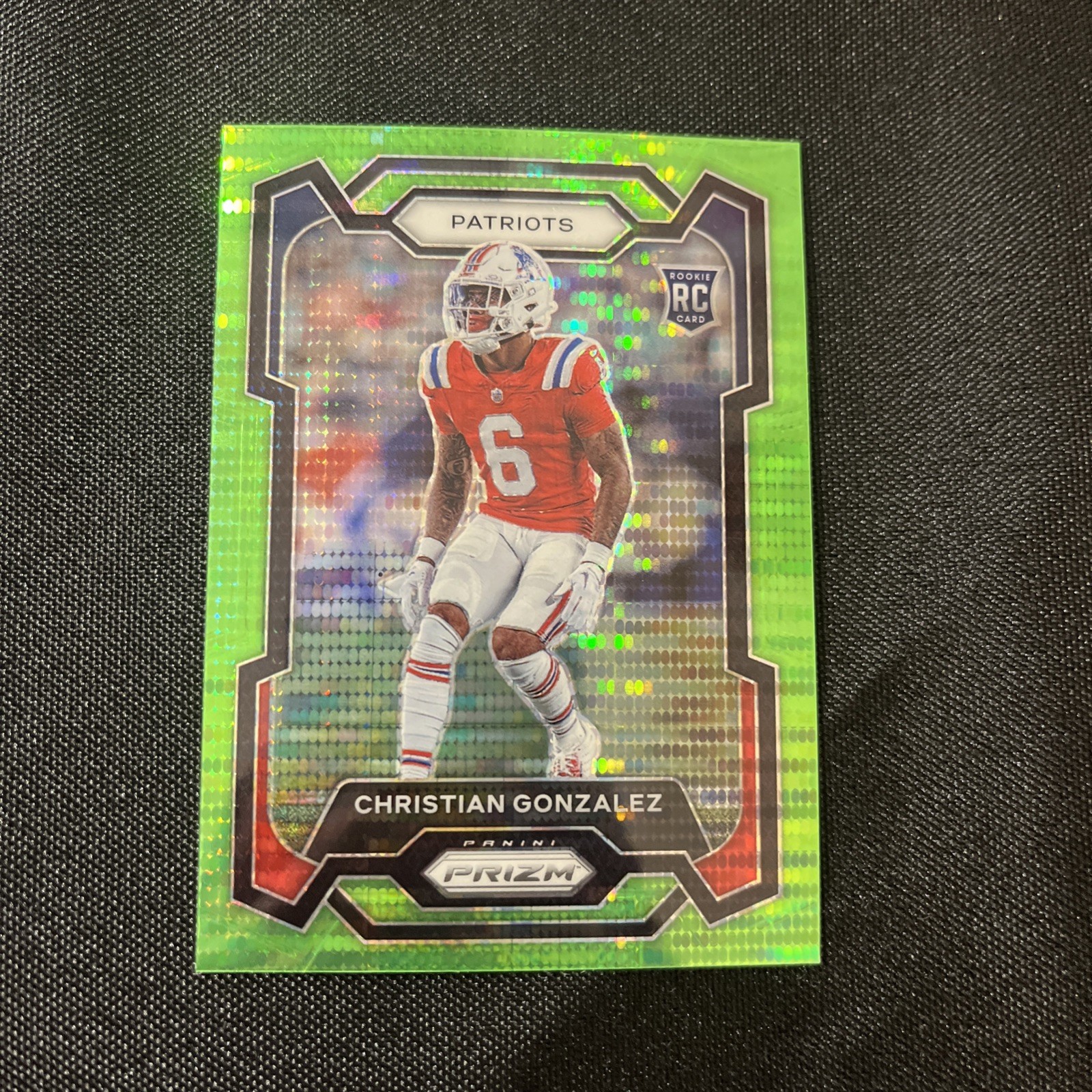 2023 Panini Prizm - Rookies Christian Gonzalez #369 Neon Green Pulsar Prizm (RC)