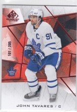 21/22 SP GAME USED..JOHN TAVARES..RED FRAGMENT../205..CARD # 82..MAPLE LEAFS