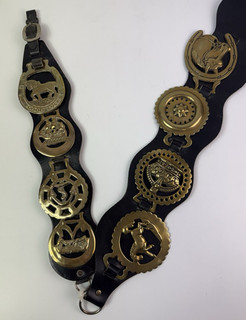 Vintage horse shoe brass medallions on brown leather handing straps x 8