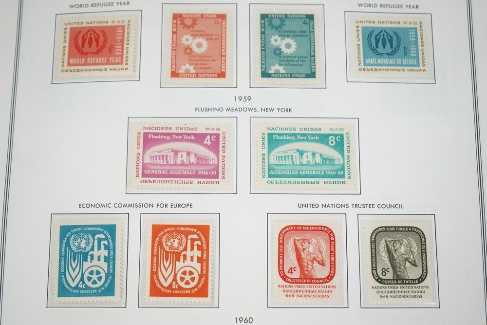 UN 1950s-1990s COLLECTION OF OVER 500 STAMPS ALL MINT STORED IN HARRIS ALBUM