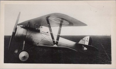 WW1 Photo of Nieuport Biplane Fighter Parked on Grass Airfield