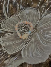 Vibrant Turtle-inspired Clay Bead Bracelet in Orange, White, and blue