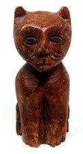 Antiguo tronco de madera maciza de árbol primitivo vintage tallado a mano gato sentado felino