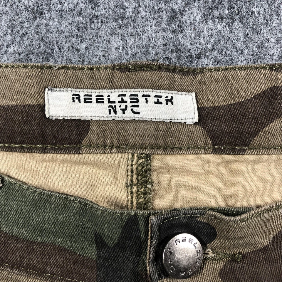 Pantalones de mezclilla Reelistik NYC para hombre 34 correas de retazos de camuflaje cremallera ropa de calle ajustados Foto 2 de 4