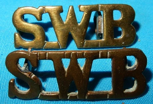 GENUINE WW1 ERA SWB SOUTH WALES BORDERERS REGIMENT SHOULDER TITLE BADGE PAIR