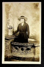 1900's RPPC Real Photo Postcard Lady In Dress & Hat Standing By Flowers