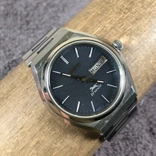 Orient Men Bronco Day Date Silver Tone 36mm Mechanical Wind Analog Watch 7 1/4"