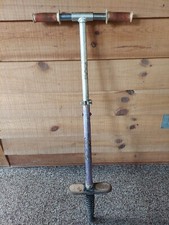 VINTAGE POGO STICK 38-1/2" TALL HANDLE TO FOOT, PURPLE WITH RED HANDLES TOY