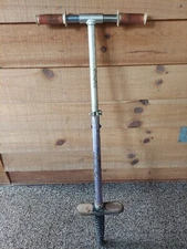 VINTAGE POGO STICK 38-1/2" TALL HANDLE TO FOOT, PURPLE WITH RED HANDLES TOY