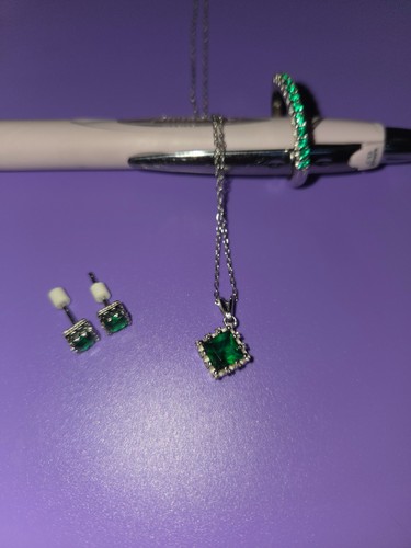 Sterling silver jewelry set with faux emerald.