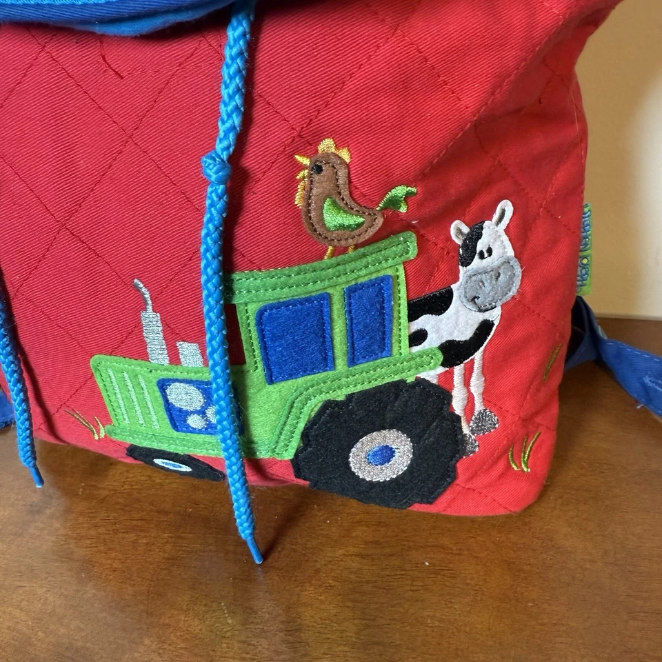 Mochila acolchada para niños Stephen Joseph animales de granja roja y azul Foto 3 de 4