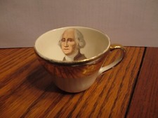 A Capsco George Washington gold trim teacup-the President's image inside the cup