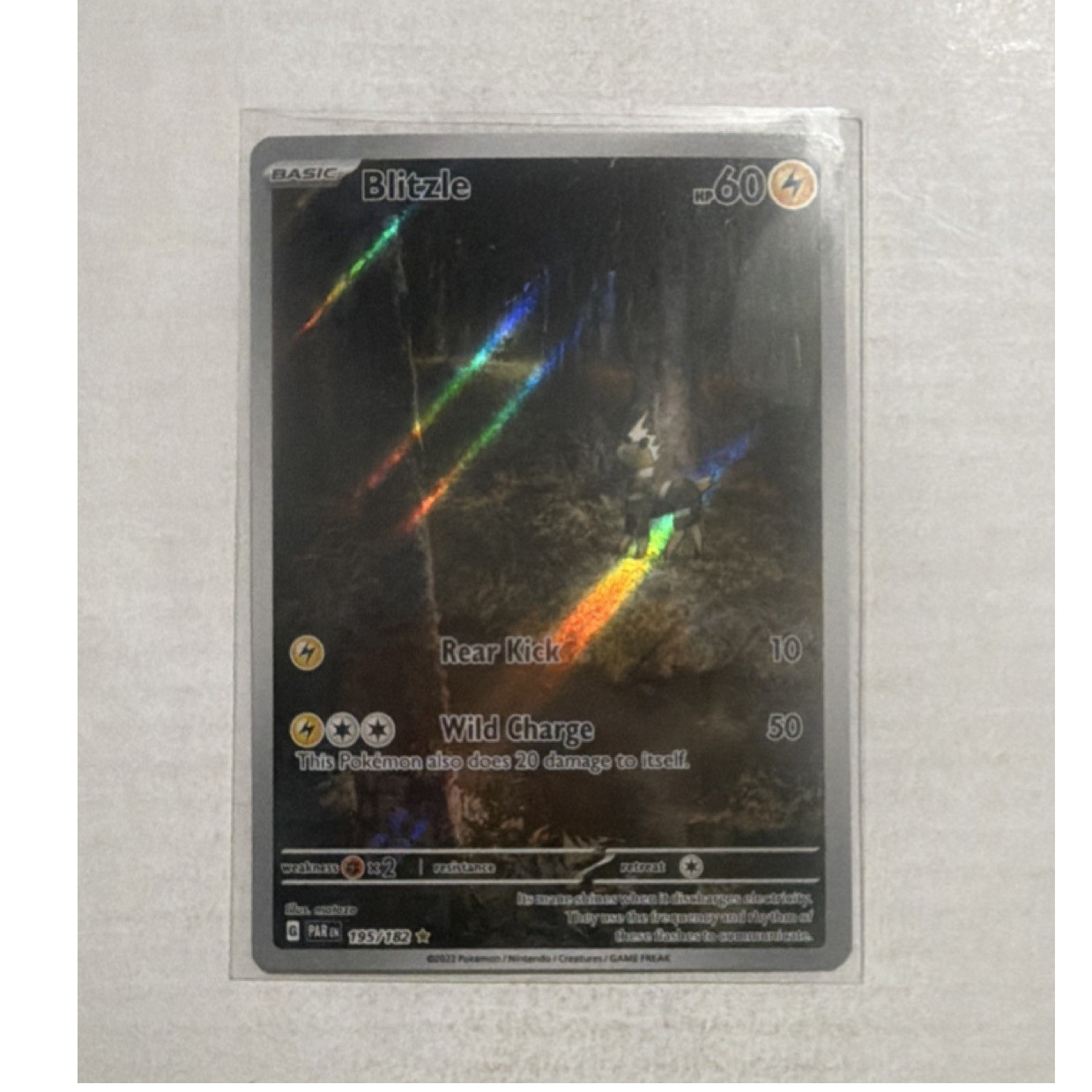 Pokemon TCG Blitzle 195/182 SV04 Paradox Rift Holo Basic 60 HP English IR