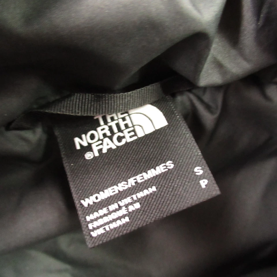 Chaleco North Face para mujer pequeño acolchado sin mangas informal bolsillos con cremallera al aire libre negro Foto 3 de 4