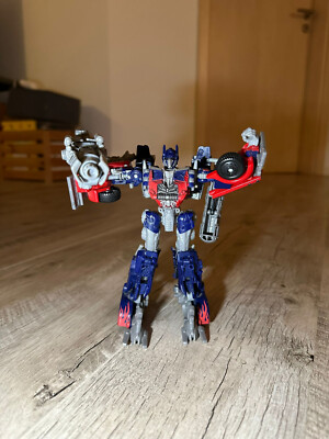 Hasbro Transformers Dark side of The Moon Mechtech Voyager Class - Optimus Prime