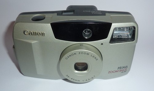 APPAREIL PHOTO ARGENTIQUE CANON PRIMA ZOOM SHOT Ai AF - Photo 4/11