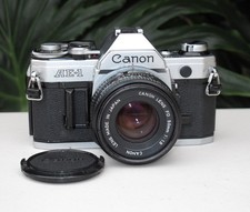 Vintage Canon AE-1 35mm SLR Film Camera Kit Bundle w/ MINT 50mm Lens No Squeak