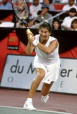 Monica Seles of Yugoslavia hits a return at a women's singles matc- Old Photo 16