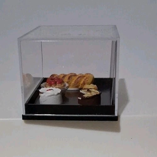 Miniaturas de porcelana para casa de muñecas Reutter pastel horneado pan pastel baguette Foto 2 de 4