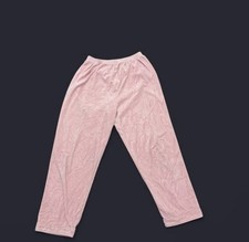 Pink velour sweatpants with elastic waistband and pockets"