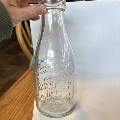 Guernsey One Quart Embossed Dairy Bottle, Oshkosh, Wi - Image 1 of 4