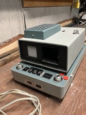 Argus President 526 Slide Projector. Has AC Cord And Extra Bulbs.