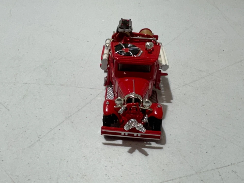 Camión de bomberos Ford AA 1932 Matchbox YFE06, de colección 1991 Foto 2 de 4
