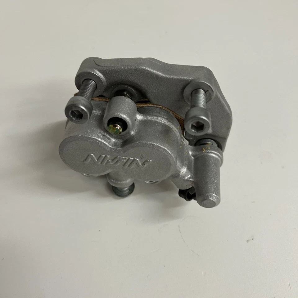 Kawasaki KX125 KX 125 1992 pinza de freno delantera reconstruida con pastillas nuevas OEM  Foto 3 de 4