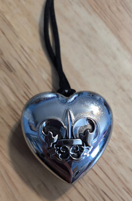 Avon Fleur de Lis Silver Toned Heart Locket on Black Cord