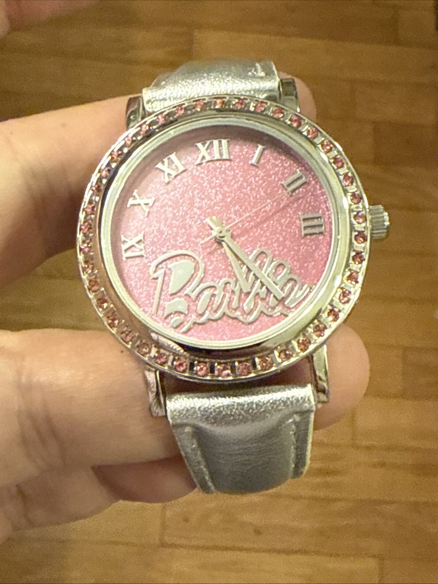 Barbie Quartz Movement Watch. Silver Leather Strap. Barbie Logo
