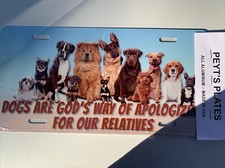 Made in the USA! Dogs Are God’s Way Of Apologizing For Relatives license plate.