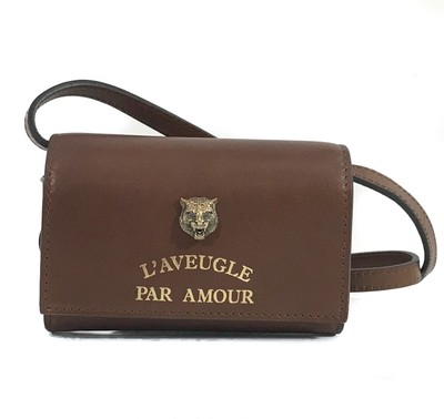 gucci bolsa with cat head