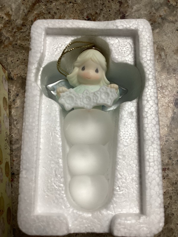 Precious Moments Ornament.  “Angel With Snowflake Trio”.  Dated 2002 on Back