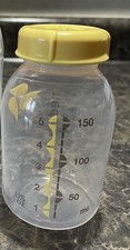 Set of 4 - 5 oz Medela Bottles with Lids