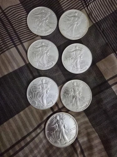 4 2010, 3 1990 American Silver Eagles 1 OZ, .999 FINE