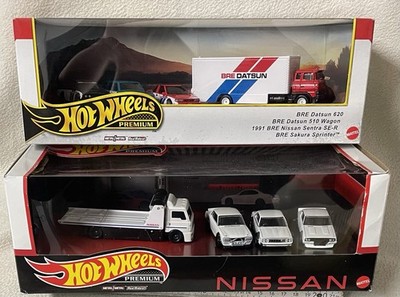 Mattel JFL99 - Hot Wheels - Premium Fahrzeug 1:64 2x 5er-Pack Nissan + Datsun