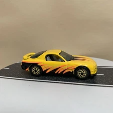 1993 Matchbox Superfast #8 Mazda RX-7 Yellow w/Gold 6 Spoke Spiral Wheels 1:64 