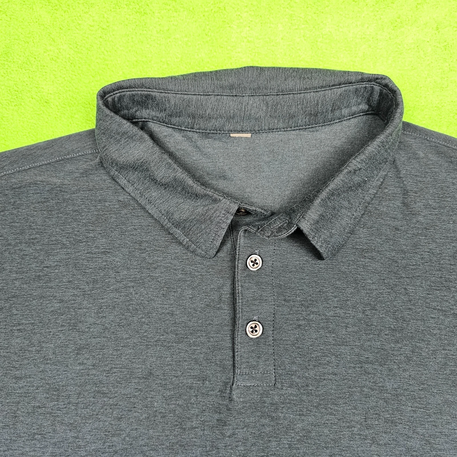 vuori strato tech heather dark golf pickle ball shirt