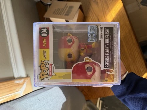 Funko POP! Vinyl: DC Heroes - Reverse Flash / The Flash Split #604 W/ Protector