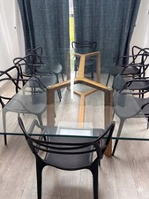 Glass top dining table - 8/10 seating. Good condition.  200cm x 90cm