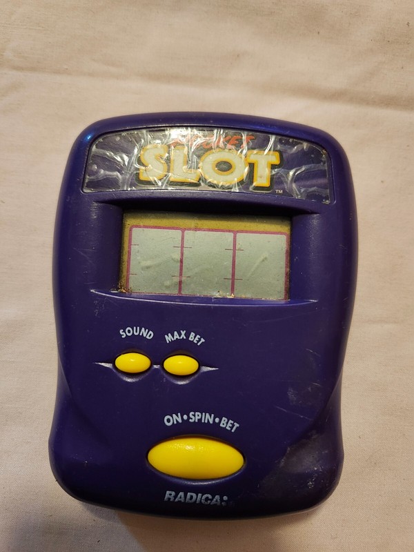 Radica 1997 Purple Pocket Slot Electronic Handheld Game Slot Machine Game TESTED