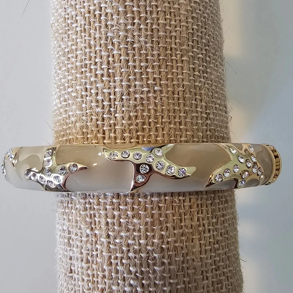 Pulsera con bisagras estrella de mar esmaltada Joan Boyce Foto 2 de 4