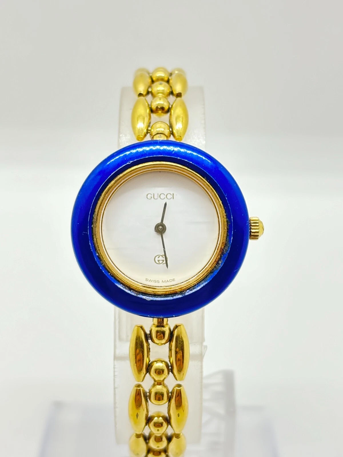 Montre femme GUCCI 11/12 lunette changeante cadran blanc métal bleu occasion fonctionne