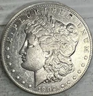 New Listing1902 Morgan Silver Dollar Uncertified About Uncirculated Condition