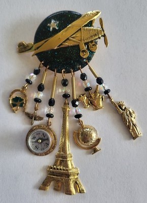 Vintage Moulin Rouge Spirit of St. Louis, Lindbergh 7 Charm Brooch Pin 3 3/4Inch