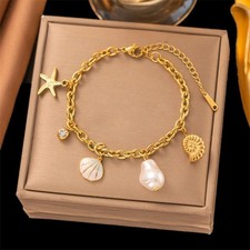 Image of Luxurious Stainless Steel Bracelet 18k Gold Plated With Two Heart Shaped Pendant