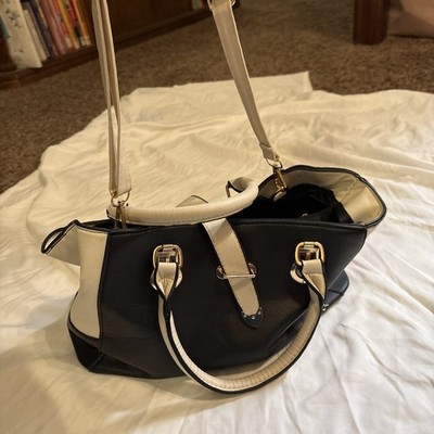 Black Leather Shoulder Bag With Handles As Well That Are Cream. Multi Pocketed 
