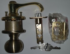 Kwikset 94009-184 400DNL Copa x Dorian Entry Lever to Knob Set Antique Brass